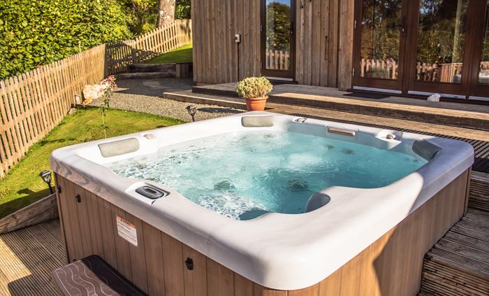 Private spa hot tub located just outside your Lodge.